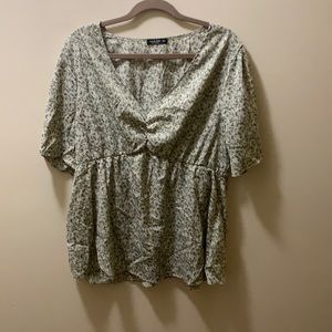 Peplum green and pink floral accent peplum top